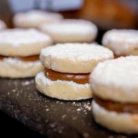 Alfajor Cookies · A traditional Argentinian Cookie, that crumbles in your mouth with sweet Dulce de Leche fill...
