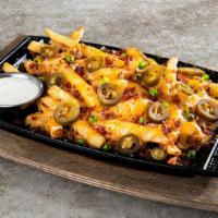 Texas Cheese Fries - Full · Shredded cheese, bacon, jalapeños, green onions. Served with house-made ranch.
