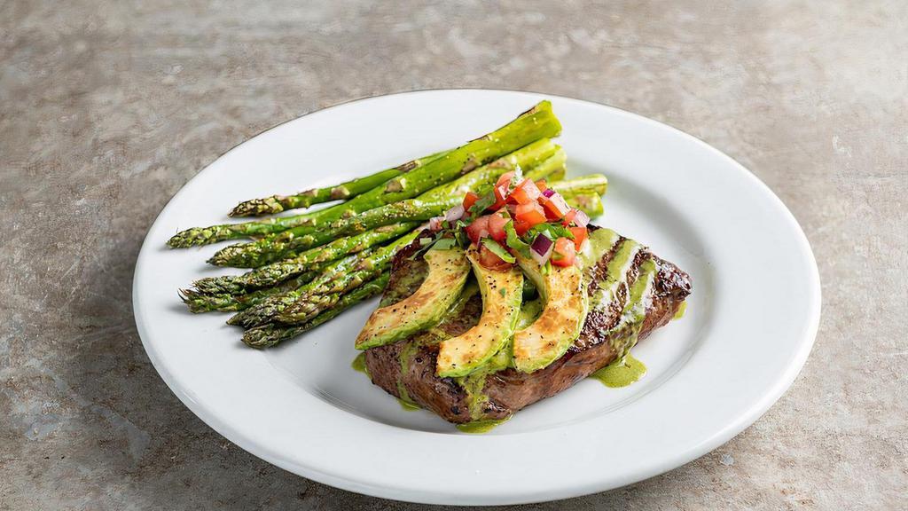 10 Oz. Classic Sirloin* With Grilled Avocado · Seasoned and topped with spicy citrus-chile sauce, grilled avocado slices, cilantro & pico. Served with roasted asparagus.