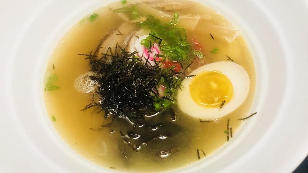 Miso Ramen · Char siu, one soft boiled egg, scallion, fish cake, kikurage, bamboo shoot, pork broth, wavy noodles.