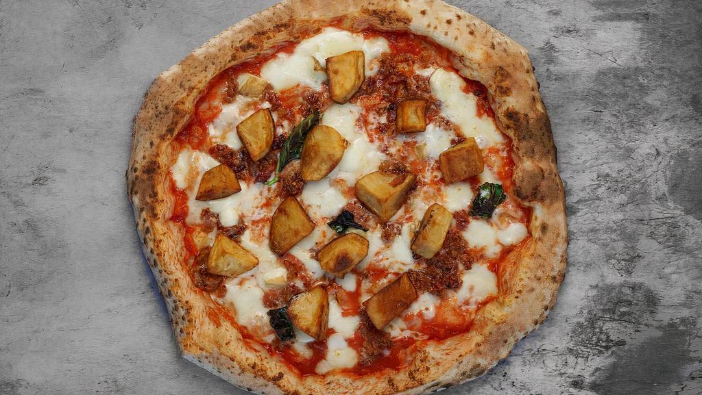 Rustica Pizza · Margherita with crispy potatoes, pancetta (bacon), and smoked buffalo mozzarella.