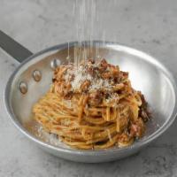 Spaghetti Carbonara · Traditional carbonara pasta with eggs, pancetta (bacon), and parmesan cheese.