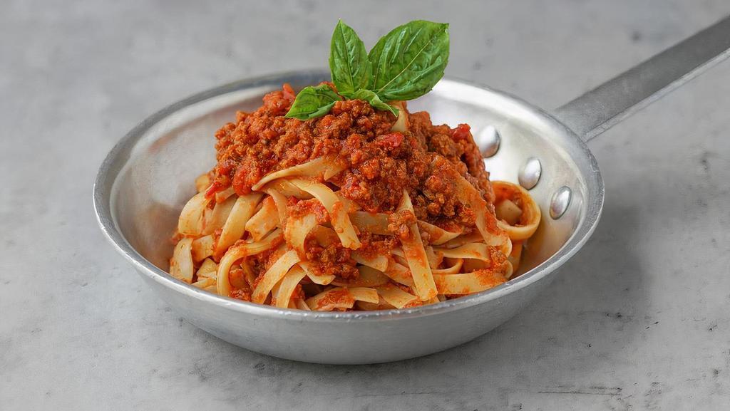 Fettuccine Bolognese Pasta · Fettuccine with all-natural beef and tomato sauce.