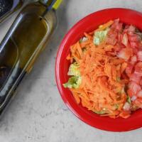 Side Salad · Lettuce, cherry tomatoes, and carrots. Served with olive oil and balsamic dressing.
