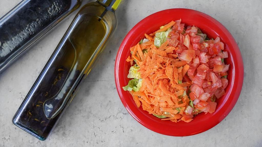 Side Salad · Lettuce, cherry tomatoes, and carrots. Served with olive oil and balsamic dressing.