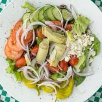 Greek Salad · Romaine lettuce, feta cheese, cucumber, pepperoncini, cherry tomatoes, artichokes, kalamata ...
