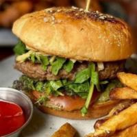 Impossible Vegan Burger · guacamole, lettuce, tomato, potato sticks, ketchup, pretzel bun & house-cut fries