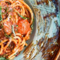 Bucatini Al Pomodoro · tomato sauce, parmigiano reggiano, basil
