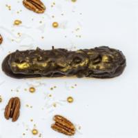 German Chocolate Eclair · The rich flavor of the German chocolate cake inspired us to make a new flavor in our eclair ...