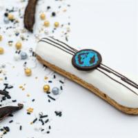 Vanilla Eclair  · the classic eclair: Vanilla pastry cream with white chocolate glaze. Classic and refined fla...