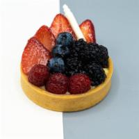 Fruit Tart · The classic fruit tart filled with vanilla cream and garnished with a variety of fresh berries