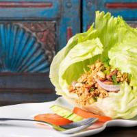 Nam Sod · Cooked ground pork, onion, shredded ginger, and roasted peanuts with a touch of lime dressin...