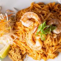 Pad Thai · Stir fried small flat rice noodles with tamarind sauce and egg, served with ground peanuts, ...