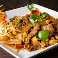 Pad Kee Mow · Stir fried big flat rice noodles with egg, basil, chili, bell pepper, onion, and mushroom.