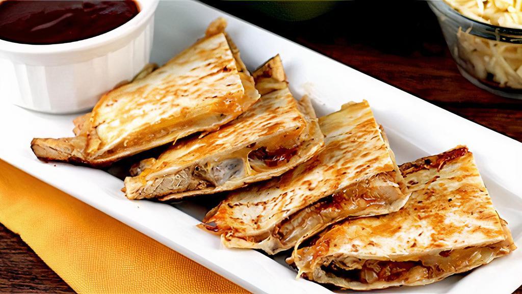 Bbq Chicken Quesadilla · Grilled chicken, shredded cheddar cheese and BBQ sauce