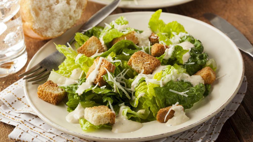 Caesar Salad · Fresh Salad made with Romaine lettuce, croutons, and parmesan cheese. Served with customer's choice of dressing.
