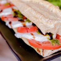 Vegetarian Sandwich · Pesto, Tomatoes, mozzarella and balsamic glaze.
