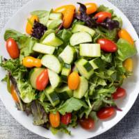 Famiglia House Salad · Lettuce, cherry tomatoes, carrots, onions dressed with lemon juice & olive oil