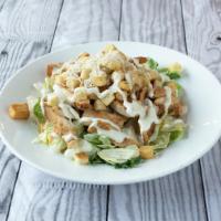 Chicken Caesar Salad · Pita bread, tomatoes, crouton, chicken, romaine lettuce, croutons and Parmesan.