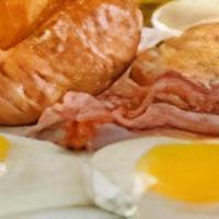 Complete Breakfast · Two eggs cooked to order, hash browns, with either ham, bacon or turkey. Your choice of wh