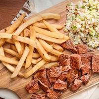 Grill Steak · Your pick of angus steak, chicken or both, along with arepitas, queso de mano, coleslaw, chi...