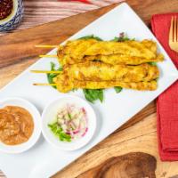 Chicken Satay · Grill marinated chicken breast on bamboo skewer, served with cucumber sauce and peanut sauce.