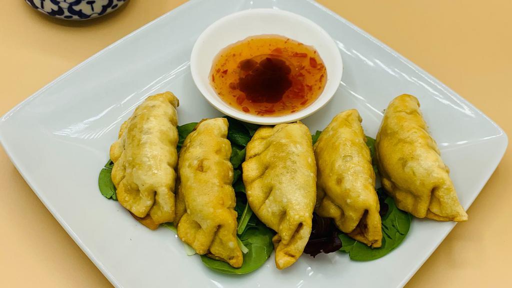 Fried Dumplings · Pork, Cabbage, Green Onion and Ginger with Sesame Oil Sweet Chili  Sauce