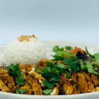Volcano Chicken · Lightly fried chicken breast topped with sweet chili garlic sauce and side of steamed rice.