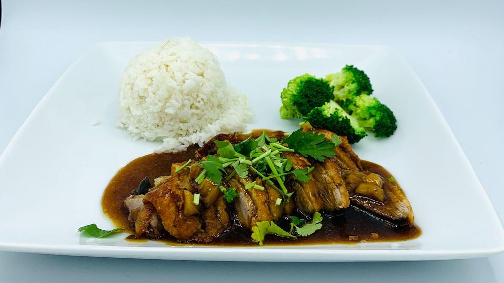 Thai Spice Roasted Duck · Slice duck meat topped with home made duck sauce , comes with steamed broccoli and steamed rice.