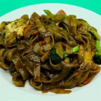 Pad See Ew · Another popular noodle dish , stir fried wide rice noodle with egg, broccoli, carrot and cho...