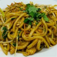 Spicy Udon · Thick, chewy wheat noodles w/egg, onion, shredded carrot, cabbage, beansprout, cilantro. cru...
