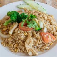 Bangkok Fried Rice · Stir fry rice with egg, broccoli, tomato and onion.