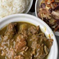 Curry Goat · Mouth-watering Curry Goat, seasoned with lots of love. Served with plain rice or rice and pe...