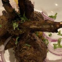 Lamb Chops · Three lamb chops in a spicy indian marination cooked in a tandoor clay oven