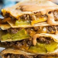 Bacon Cheeseburger Quesadilla · Ground beef, cheese, bacon, grilled onions, tomatoes, pickles, mustard and ketchup.