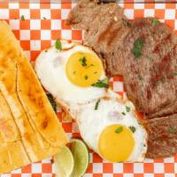 Bistec A Caballo / Flank Steak And Eggs · Con papitas y 2 huevos fritos. / With french fries and 2 fried eggs.