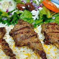 Lamb Chops (3Pc) · Chops marinated in garlic, rosemary, thyme, and olive oil, then grilled to 
create a wonderf...