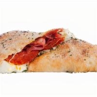 Meat Calzone · Four cheese blend (parmesan & romano, ricotta, and shredded mozzarella) with ham, salami, pe...