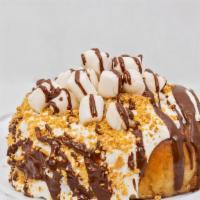 S’More-Licious Cinnamon Roll · Frosting, graham crackers, marshmallows, chocolate drizzle