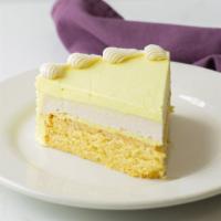 Lemon Cheesecake Cake Slice · Vegan. Vegan lemon cake with a top layer of cheesecake.