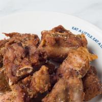 Leroy'S Crispy Ribs · Earls famous dry ribs, savory and seasoned with coarse salt and black pepper.