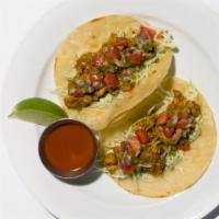 Street Chicken Tacos · Corn tortillas, white cheddar, cabbage, jalapeño crema, slow roasted achiote chicken, cilant...