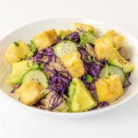 Crispy Tofu Zen Bowl · Jasmine rice, daikon, red cabbage, avocado, mushrooms, cucumber, snap peas, sesame salt.