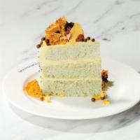 Celebration Cake · Triple-layered white confetti cake, salted toffee buttercream, honeycomb snaps, crisp pearls.