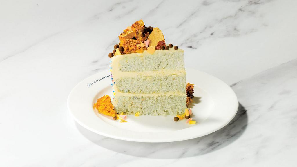 Celebration Cake · Triple-layered white confetti cake, salted toffee buttercream, honeycomb snaps, crisp pearls