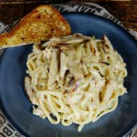 Kid'S Pasta Alfredeaux · Served with garlic bread.
