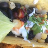 Earth Day Grilled Veggies · Zucchini, portobello mushrooms and caramelized onions topped with southwest black bean and c...