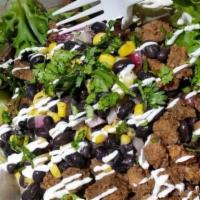 Rodeo Grilled Steak · Topped with southwest black bean and corn salsa, thai sweet chili sauce, sour cream and cila...