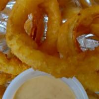 Bubble Onion Rings · 5 delicious beer battered onion rings seasoned to perfection serves with a side of bubble sa...