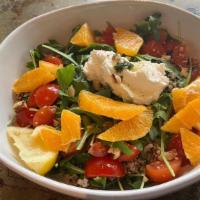 Quinoa Salad · Bed of arugula, quinoa, ricotta cheese, cherry tomatoes, walnuts, orange and home made sauce